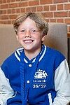 kind in blauw jasje